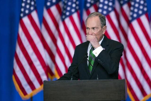 Mike Bloomberg pauses as he speaks to supporters about the suspension of his campaign, and endorsement of Joe Biden in New York on 4 March 2020