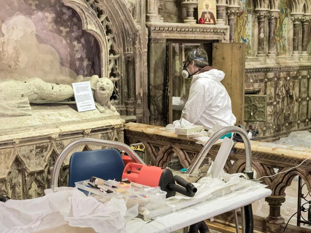 Removing the bones from their late 19th century alcove