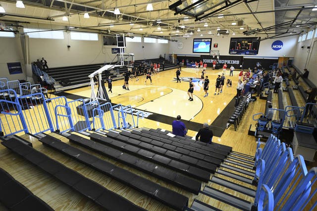 A mostly empty Goldfarb Gymnasium at Johns Hopkins University where Yeshiva University played against Worcester Polytechnic Institute in a game without spectators after cases of COVID-19 were confirmed in Maryland