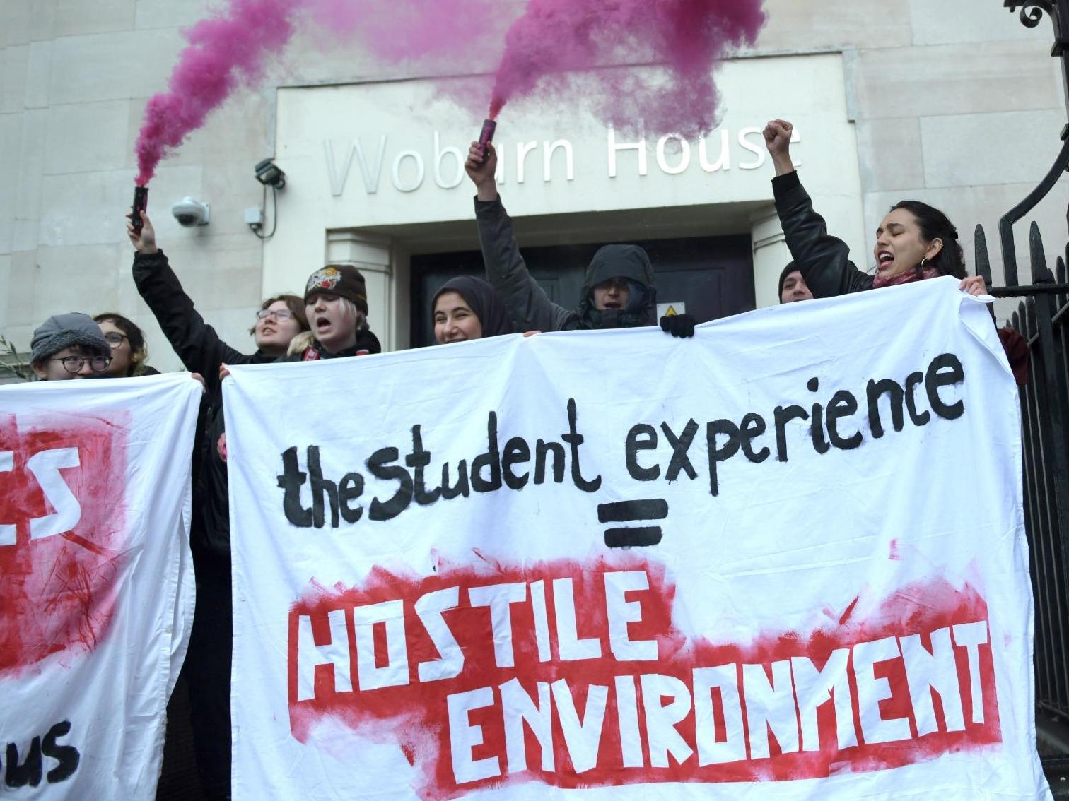 Student activists from the Undoing Borders movement protest outside a Universities UK conference, calling for an end to the hostile environment on campus, on 27 February 2020.