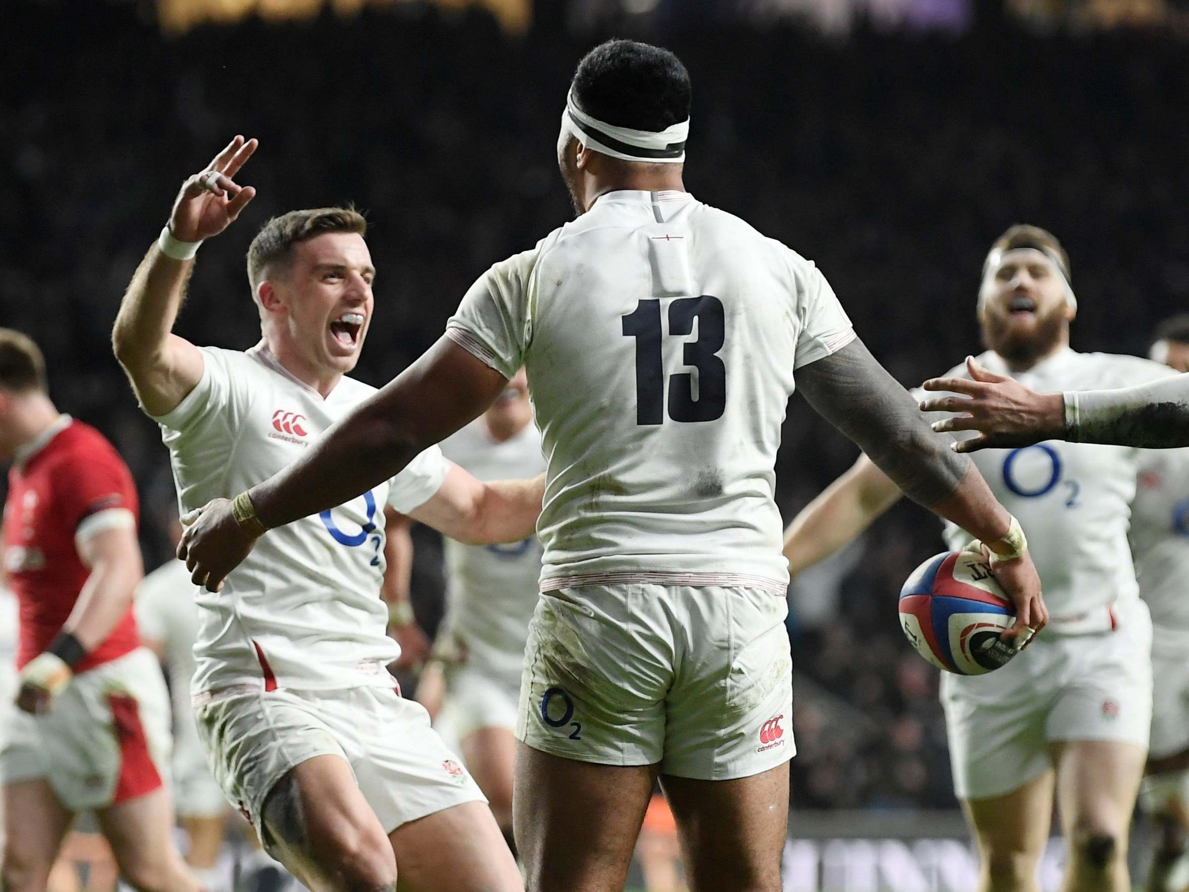 Tuilago celebrates with Ford after scoring England's third try (Reuters)