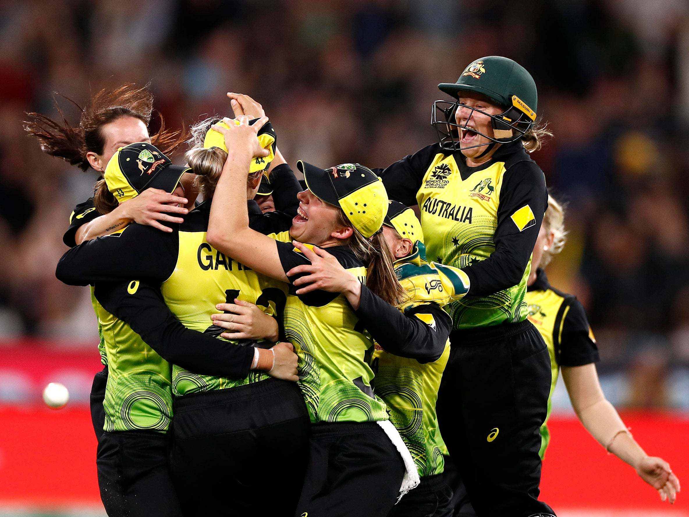 Australia celebrate clinching the World Cup against India