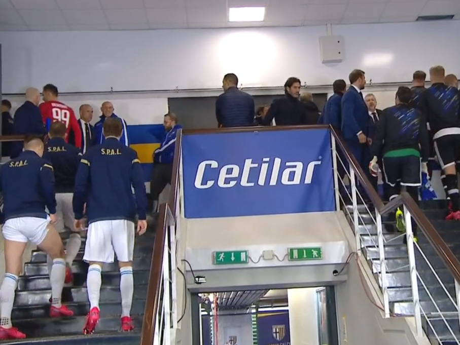 Parma and SPAL players are forced to wait in the tunnel while a decision over coronavirus is discussed