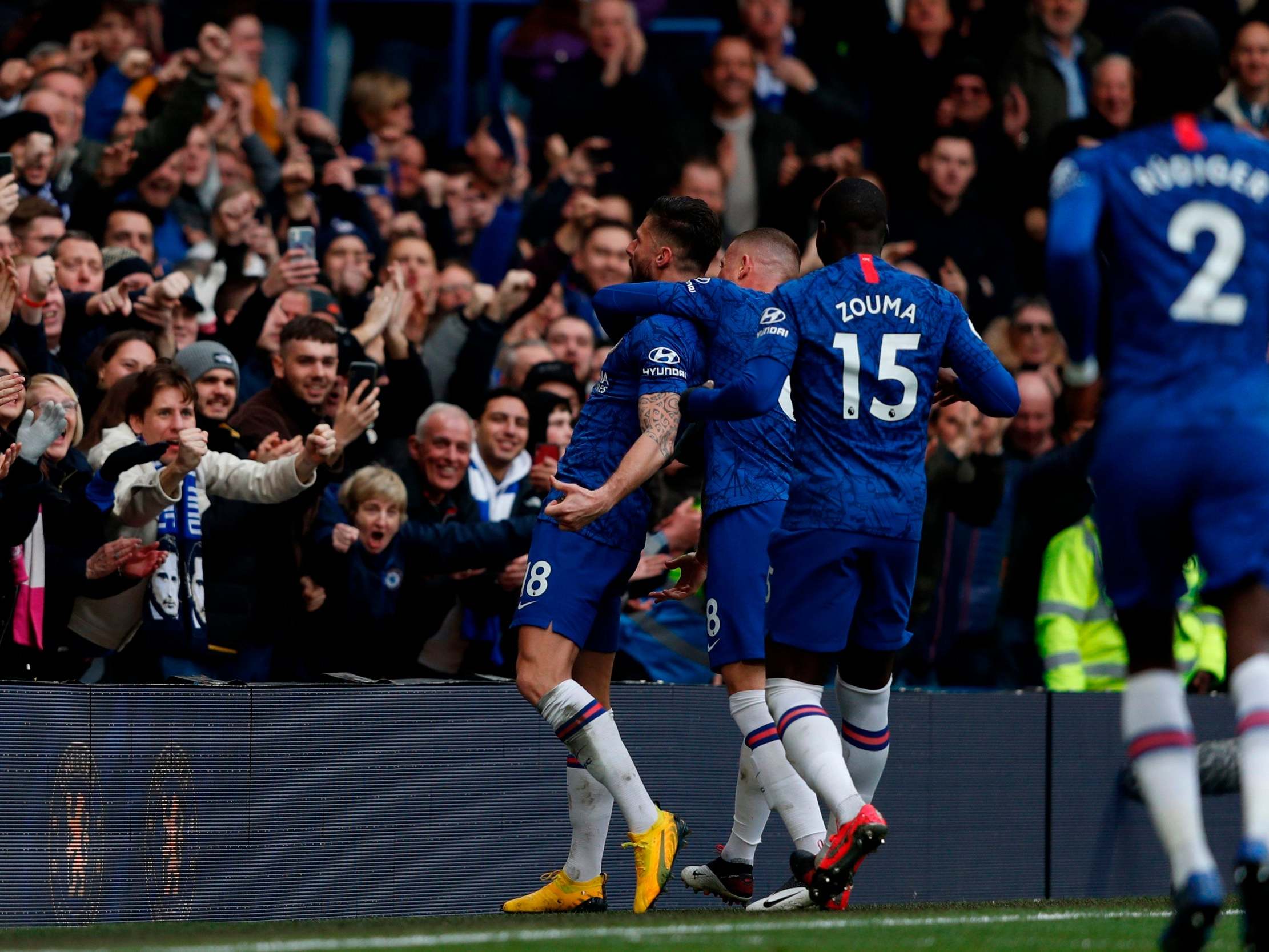 Olivier Giroud celebrates after scoring the fourth for Chelsea