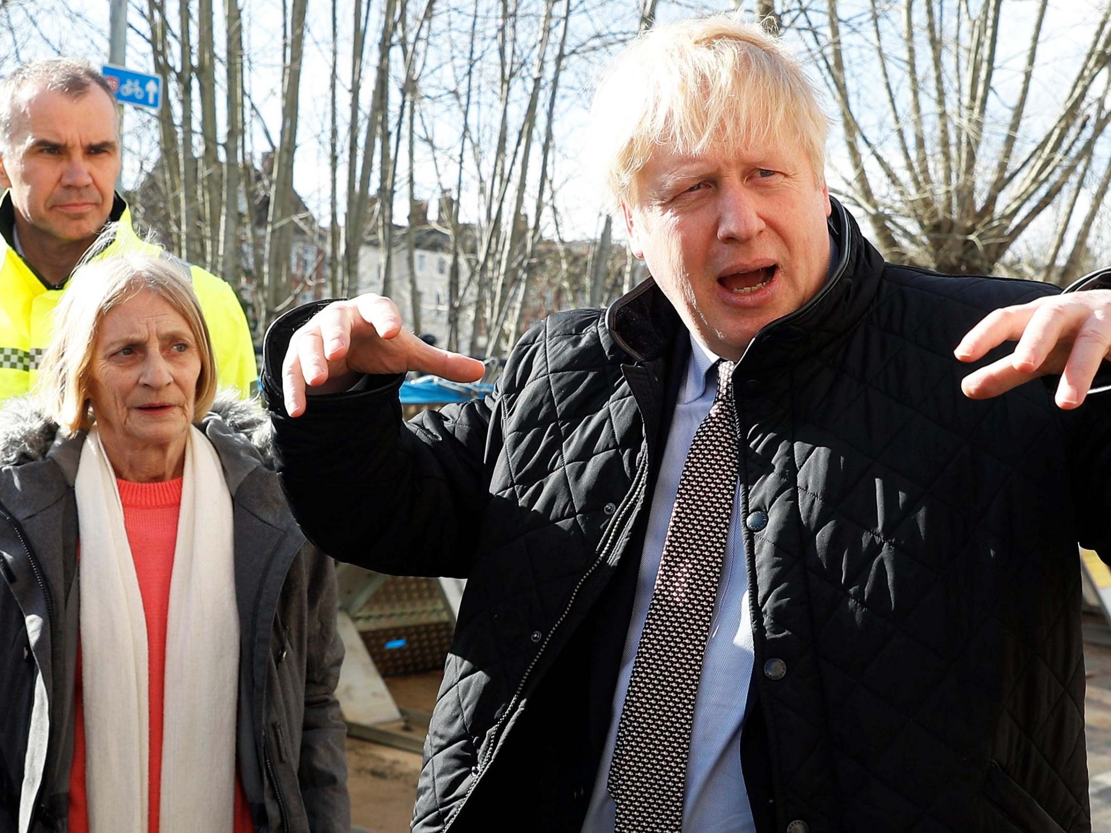 &apos;Traitor&apos;: Boris Johnson is heckled as he visits town devastated by flooding