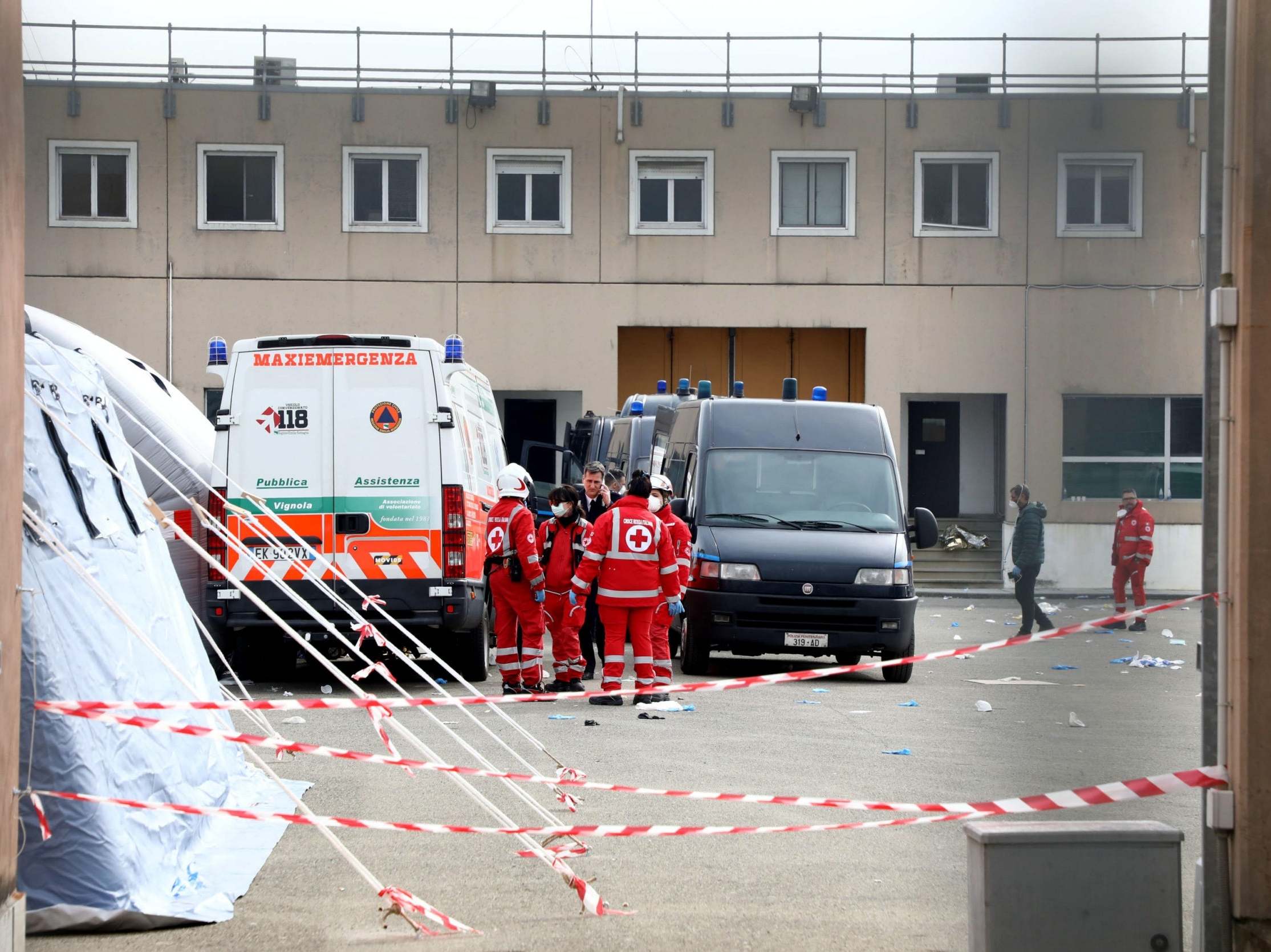 Emergency health workers arrive at the Sant'Anna prison, where inmates protested against anticoronavirus measures