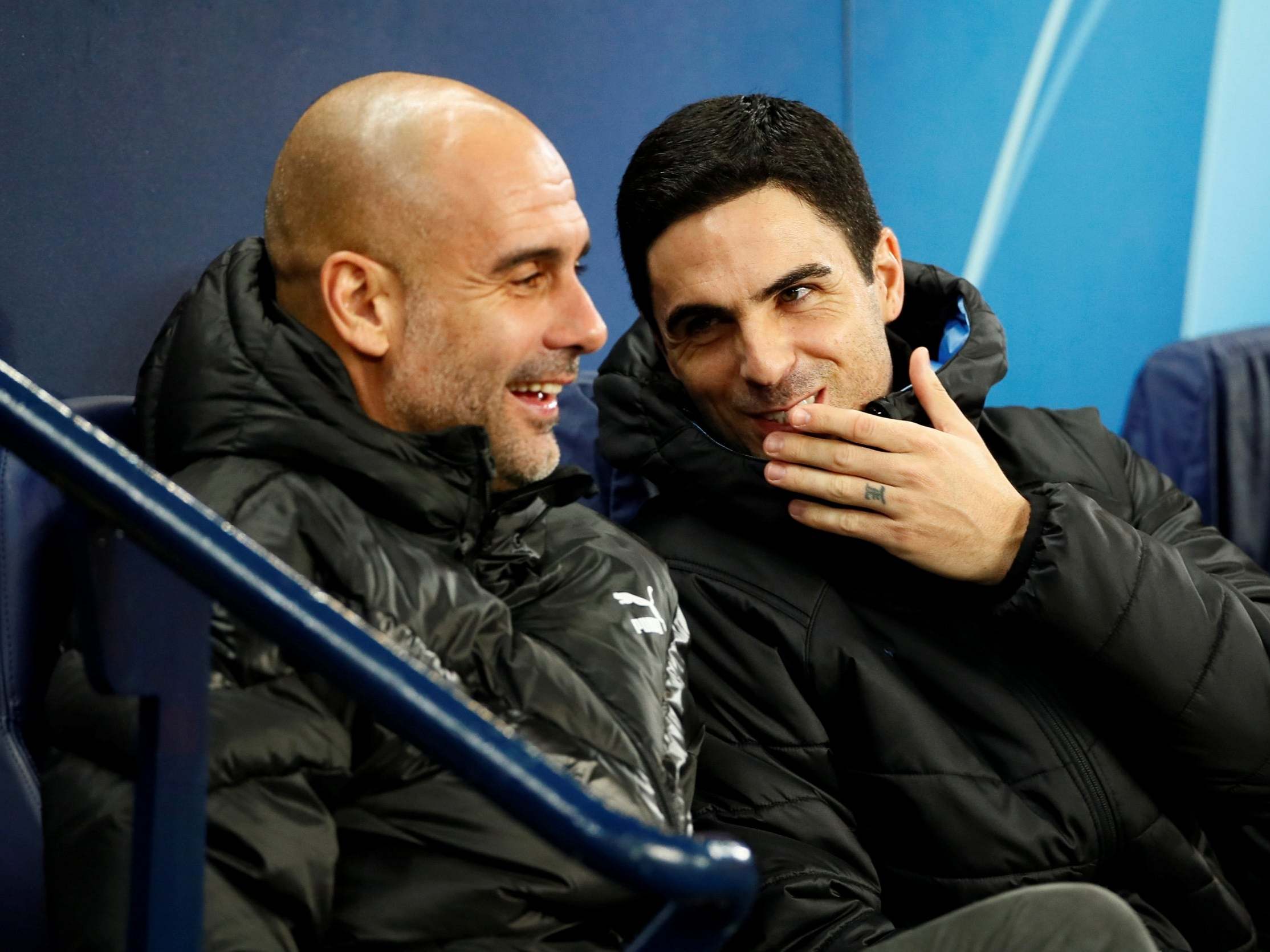 Manchester City manager Pep Guardiola and assistant coach Mikel Arteta
