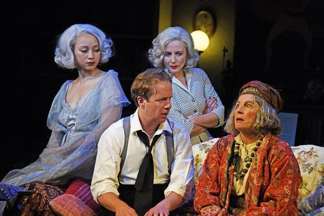 Saunders as unapologetically eccentric Arcati, with Geoffrey Streatfeild as Charles Condomine, Emma Naomi as Elvira, left, and Lisa Dillon as Ruth