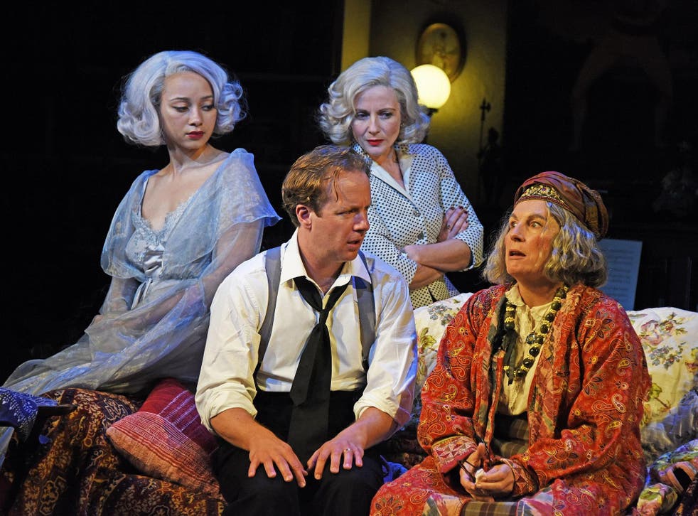 Saunders as unapologetically eccentric Arcati, with Geoffrey Streatfeild as Charles Condomine, Emma Naomi as Elvira, left, and Lisa Dillon as Ruth