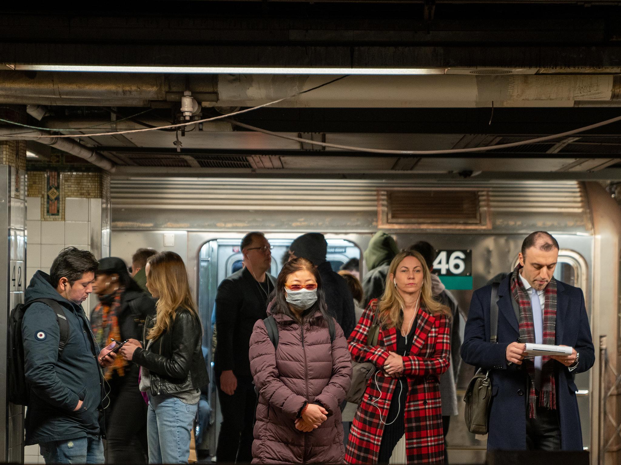 A traveller wears a medical mask at Grand Central station