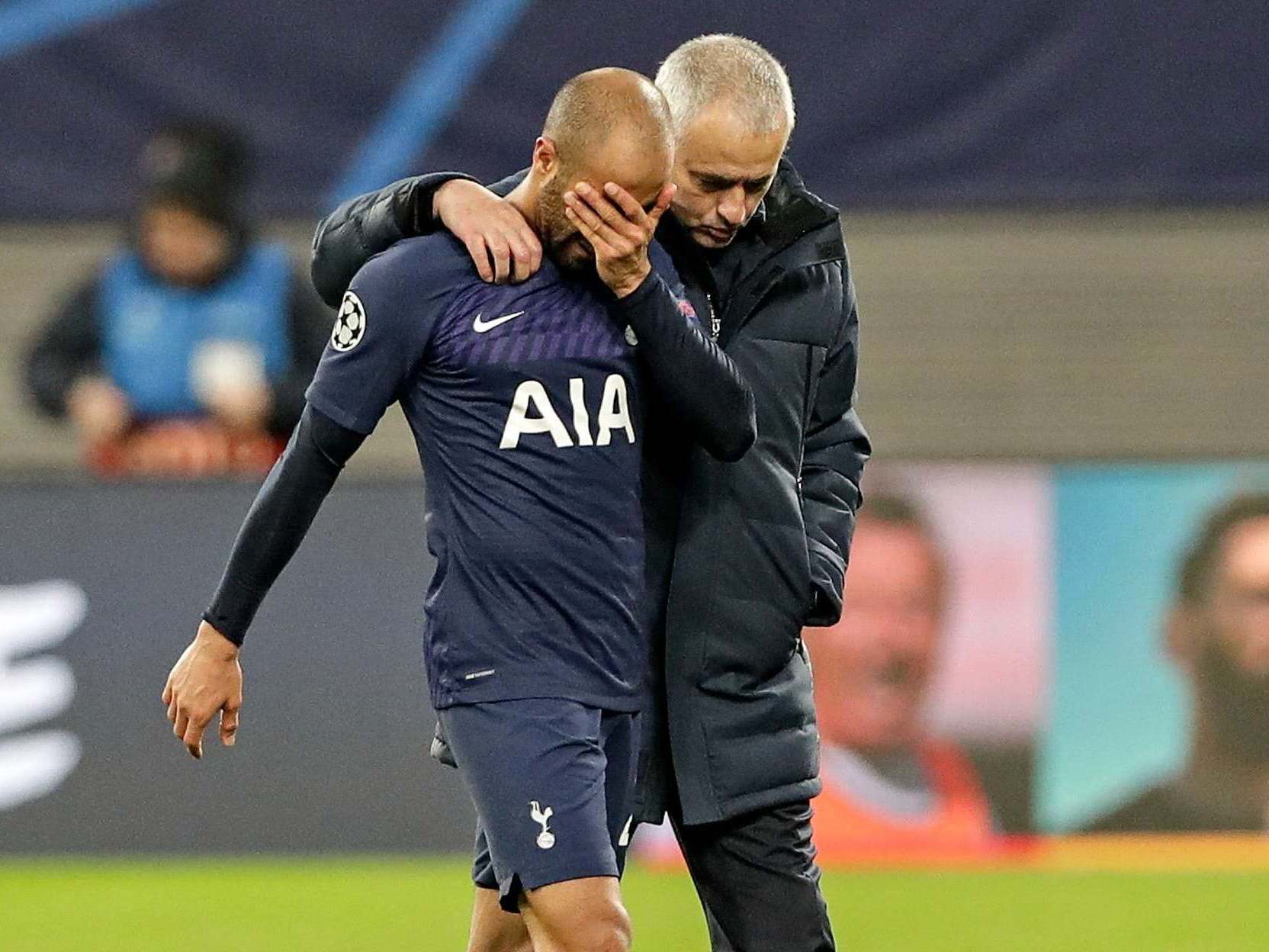 Tottenham's manager Jose Mourinho (right) comforts Lucas Moura