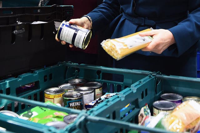 Food banks are running low on supplies and donations as coronavirus fears trigger stockpiling