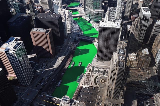 CHICAGO, ILLINOIS - MARCH 16: An aerial view of the Chicago River as it winds its way through downtown after being dyed green in celebration of St. Patrick's day on March 16, 2019 in Chicago, Illinois. Dyeing the river green has been a St. Patrick's Day tradition in the city since 1962.