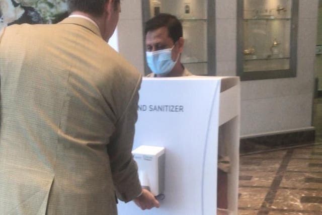 Saudi Aramco has been criticised after images showed a worker dressed in a hand sanitiser box