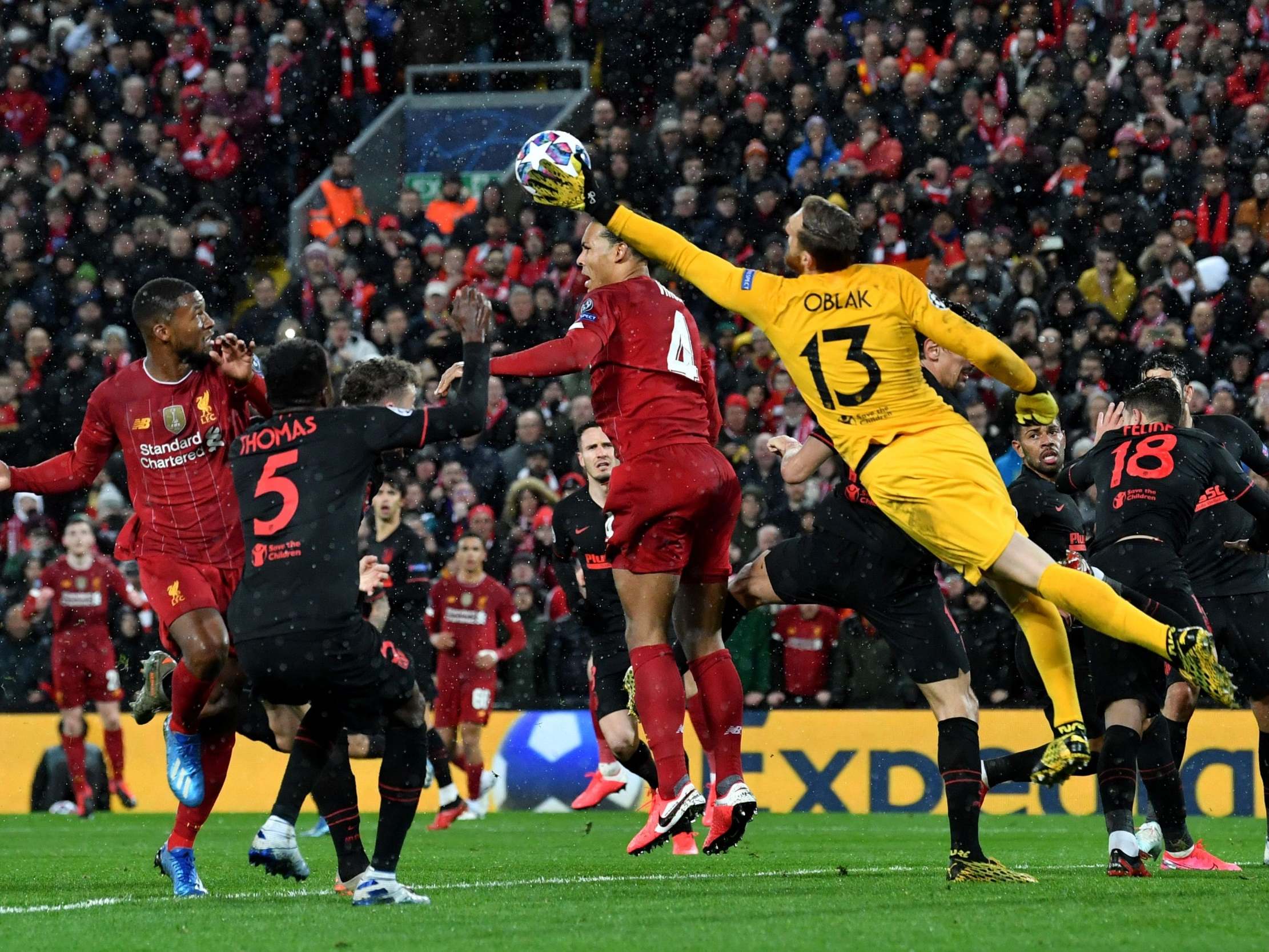 Atletico Madrid’s Jan Oblak punches the ball