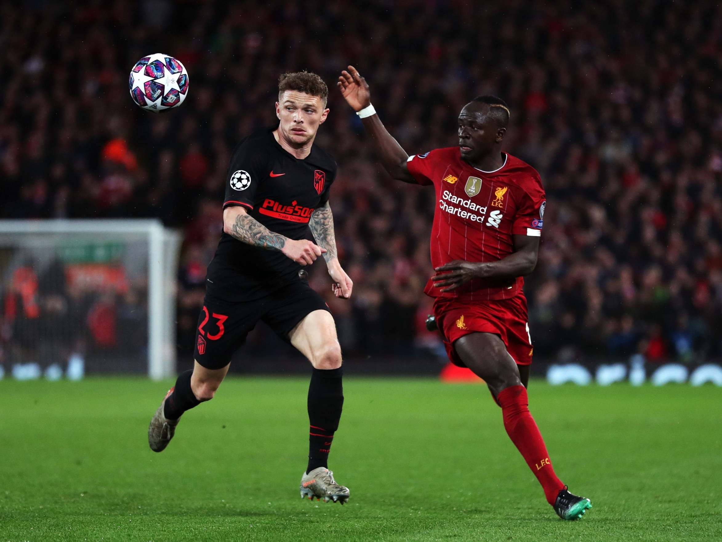 Atletico Madrid’s Kieran Trippier and Liverpool’s Sadio Mane