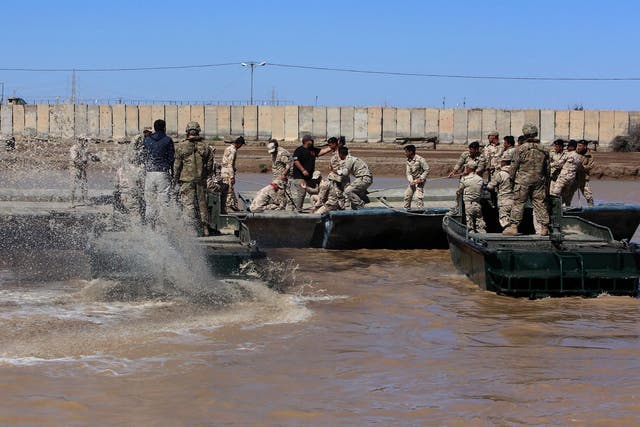 Coalition forces and Iraqi soldiers during a 2017 training session at Camp Taji, where a British medic and two Americans were killed by a rocket attack on 11 March, 2019