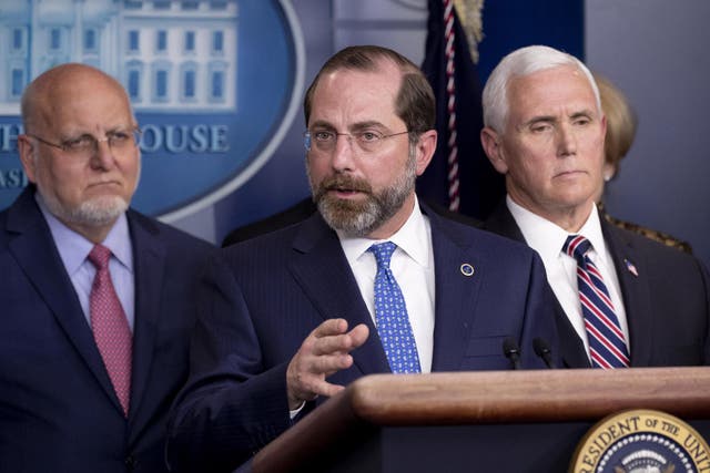 <p>On Monday, Congress subpoenaed CDC director Dr Robert R Redfield (left), and secretary of Health and Human Services Alex Azar (center), alleging undue White House interference with the coronavirus response</p>