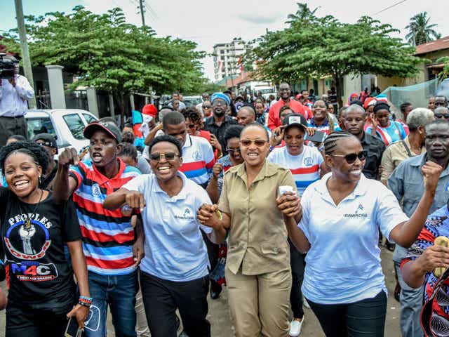 Chadema MPs, Halima Mdee (3rd L), Ester Matiko (4th L) and Ester Bulaya (5th L) celebrate with supporters after being released from Segerea prison