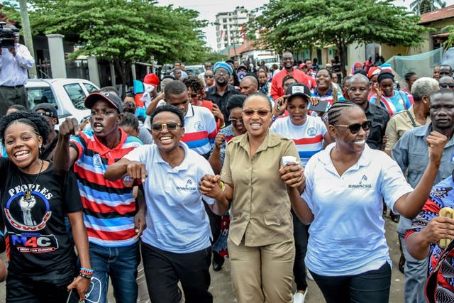 Chadema MPs, Halima Mdee (3rd L), Ester Matiko (4th L) and Ester Bulaya (5th L) celebrate with supporters after being released from Segerea prison