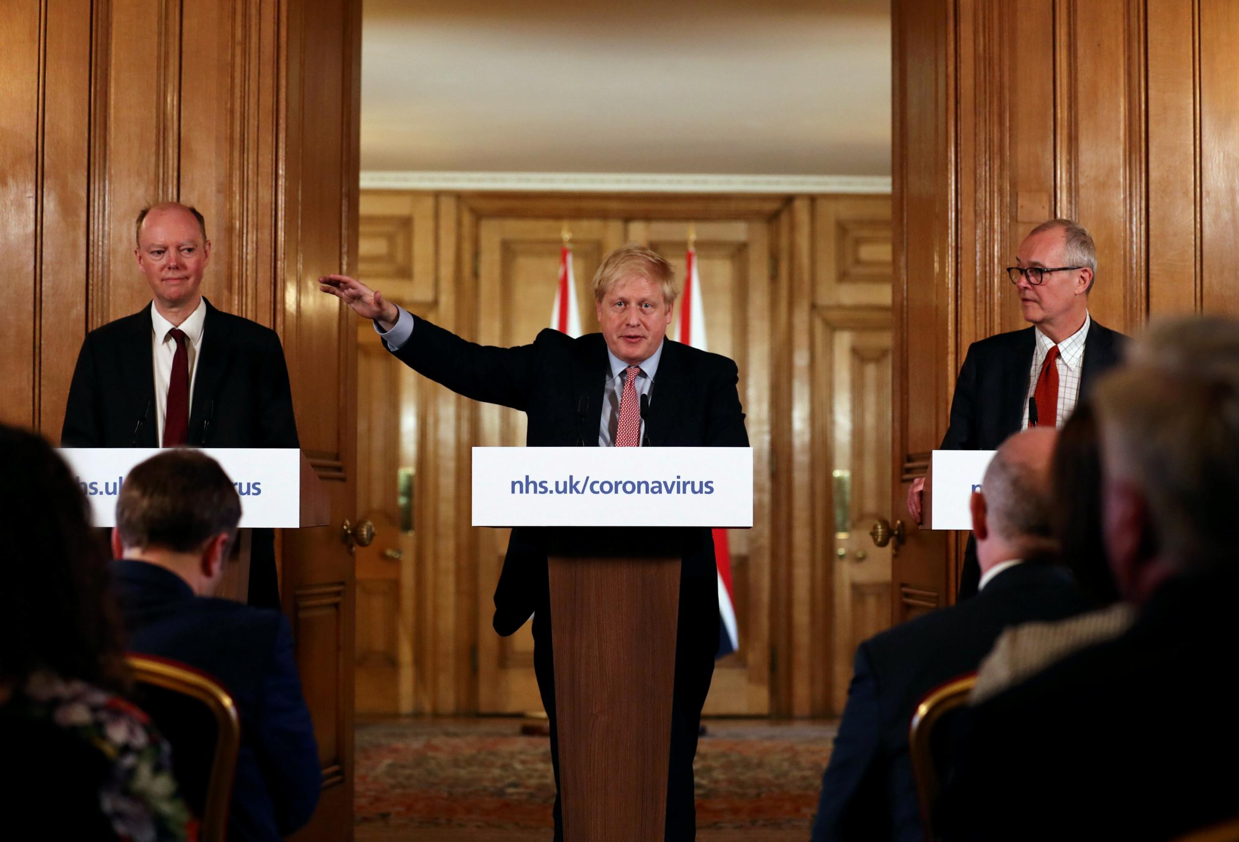 Chris Whitty, Boris Johnson and Patrick Vallance address a press conference in 10 Downing Street