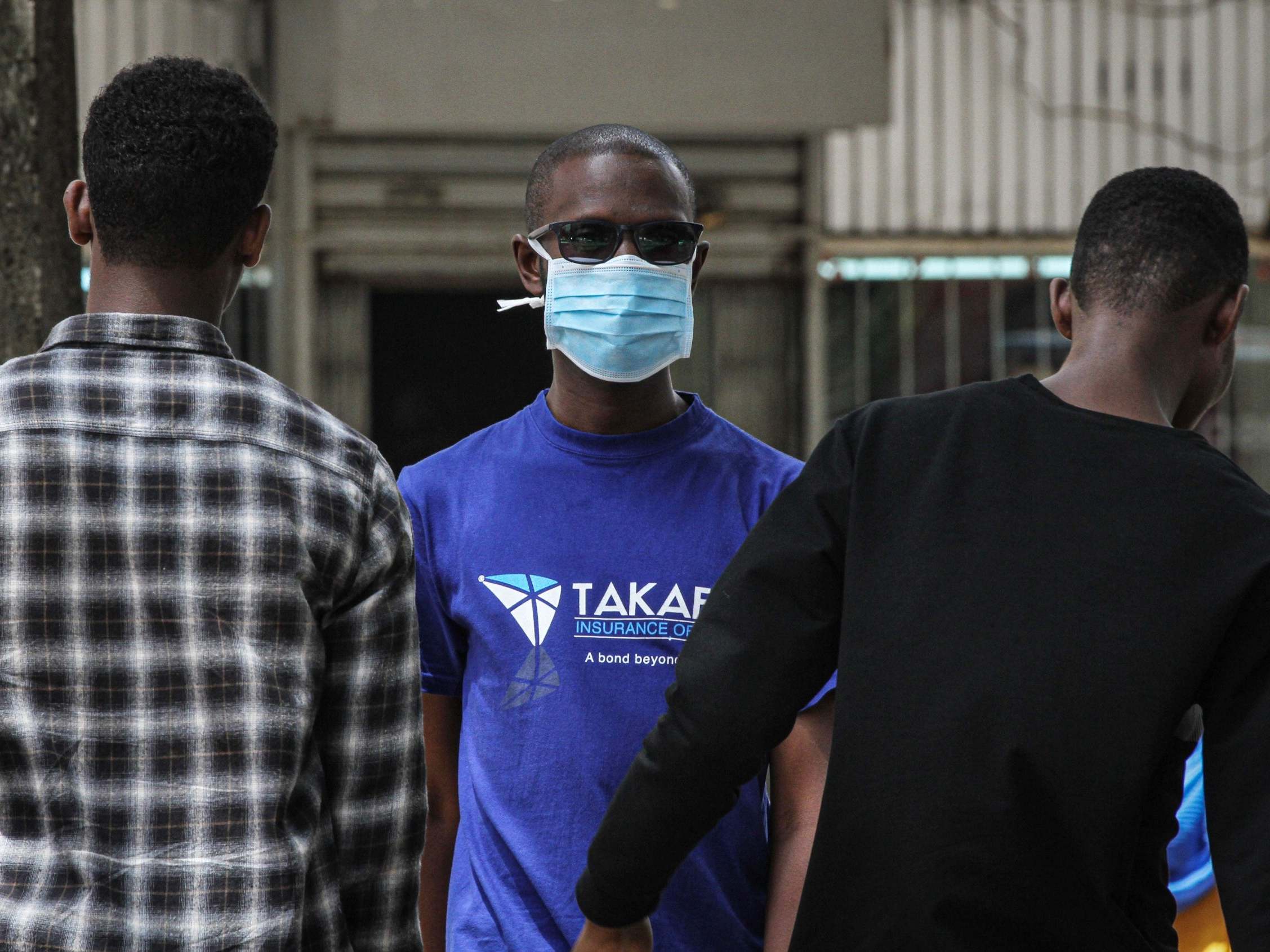 A man wears a protective mask in Nairobi, Kenya