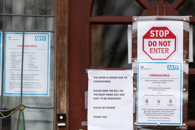 A ‘Do not enter’ sign at the door of a GP surgery in north London