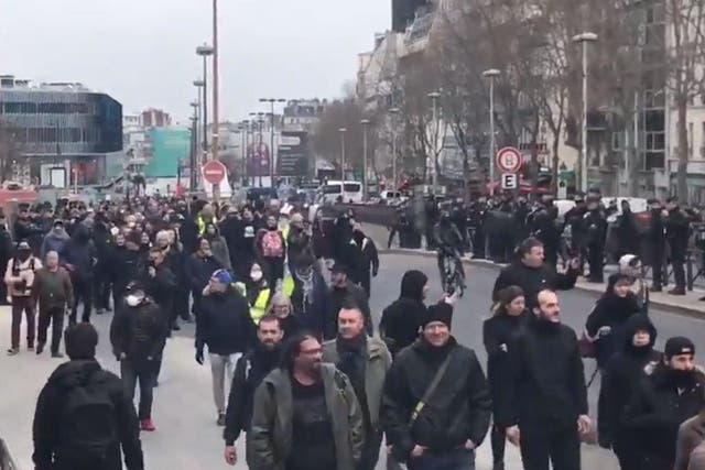 A screengrab of demonstrators marching in Paris on 14 March 2020