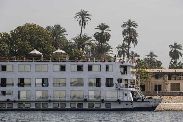 A March 10 2020 picture shows the Asara Nile cruise ship docked in the Egyptian city of Luxor where 45 suspected Covid-19 cases were detected