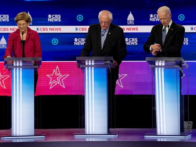 Elizabeth Warren, Bernie Sanders and Joe Biden pause during a commercial break at the tenth Democratic 2020 presidential debate at the Gaillard Center in Charleston, South Carolina, on 25 February 2020