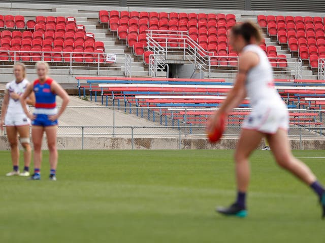Empty seats are seen due to the coronavirus outbreak during an AFL womens' match