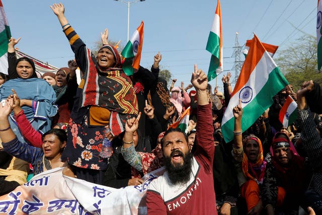 Protesters at Shaheen Bagh, Delhi, shout slogans against new citizenship laws on 16 February