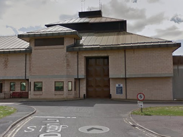 An officer at HMP High Down is thought to be the first person within the prison system to contract coronavirus
