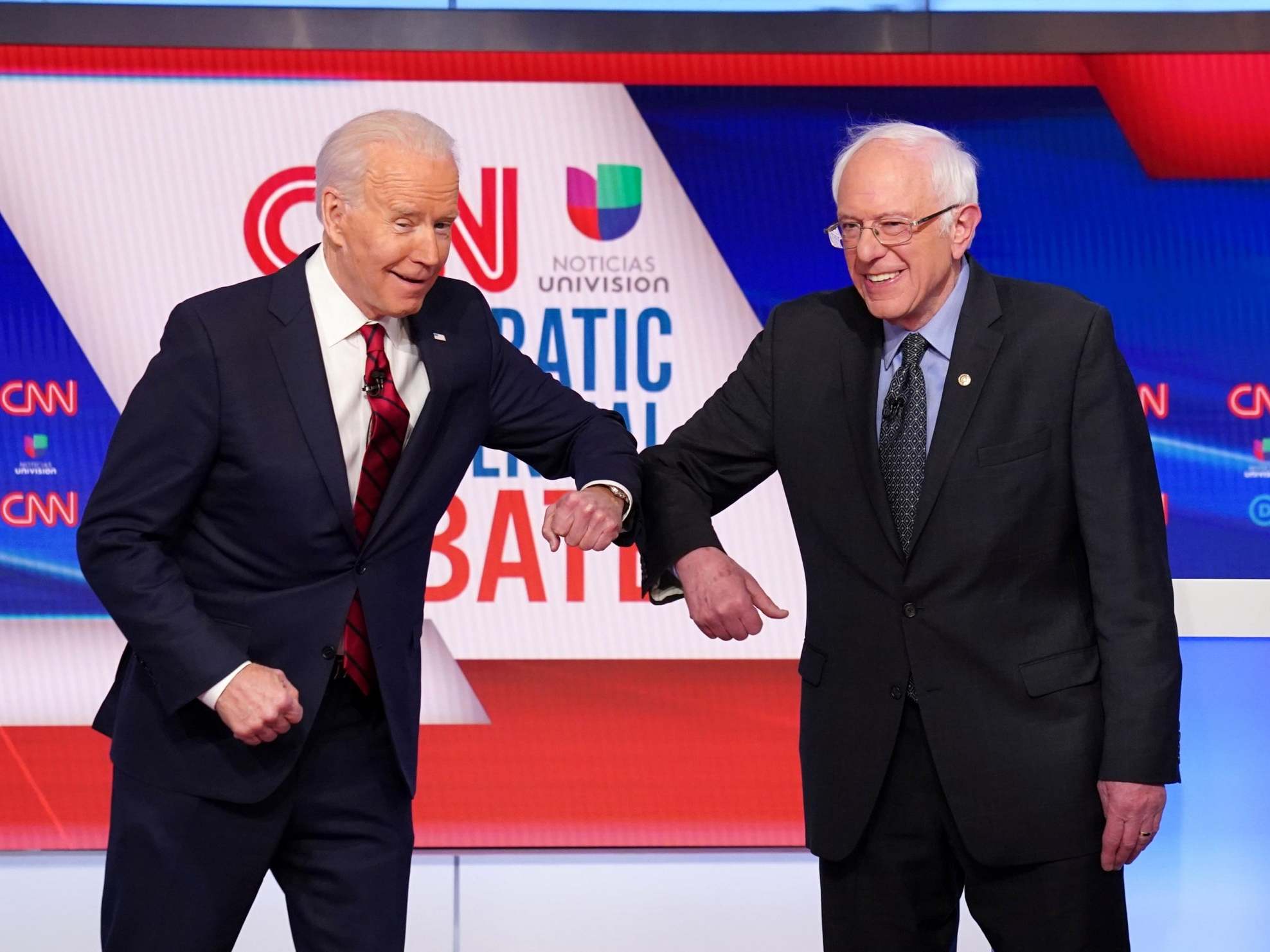 Joe Biden and Bernie Sanders greet with the coronavirus ‘handshake’ (Re