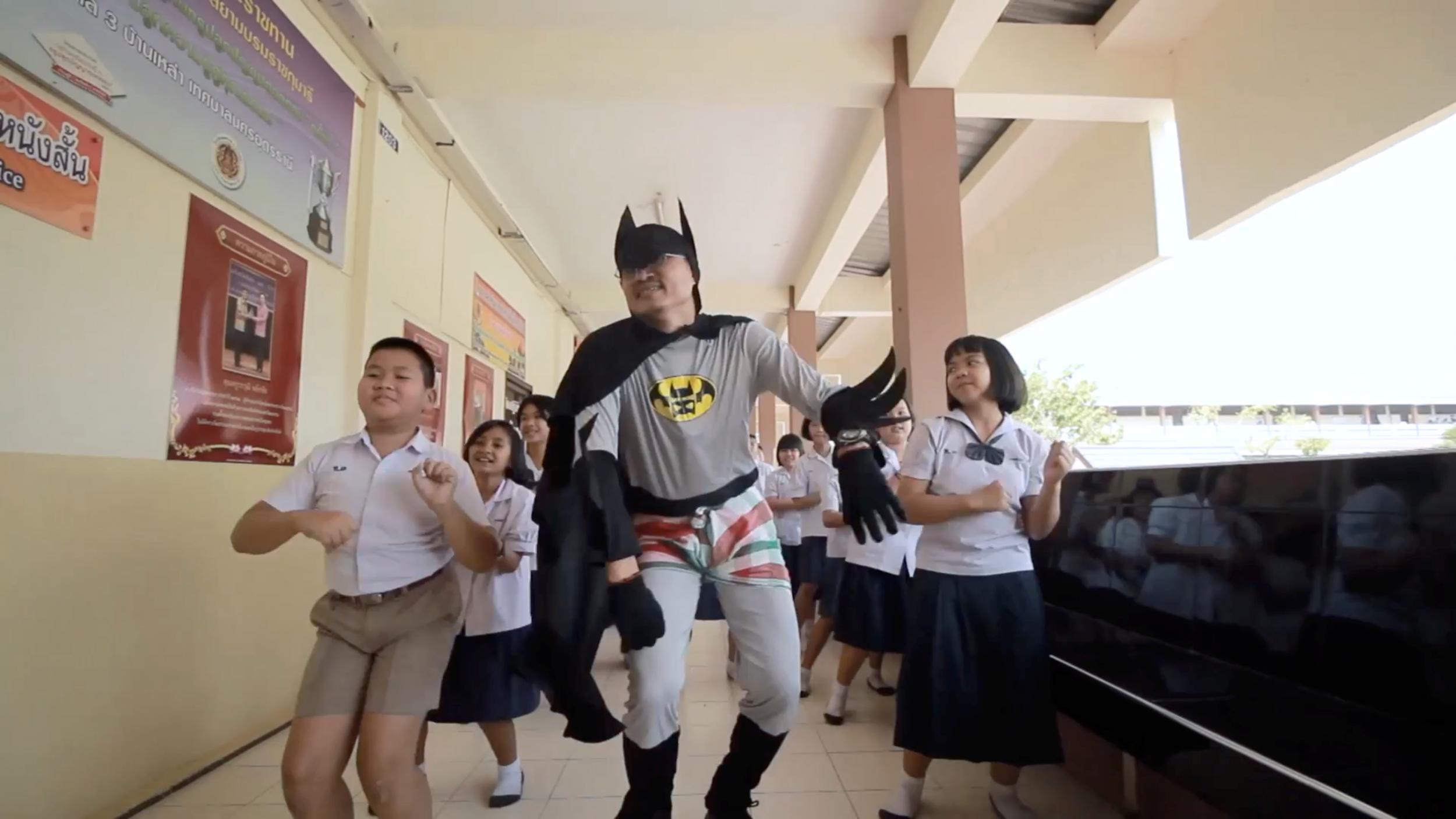 Coronavirus Thai Teacher Dresses Like Batman And Uses Music To Fight The Coronavirus In Community The Independent The Independent