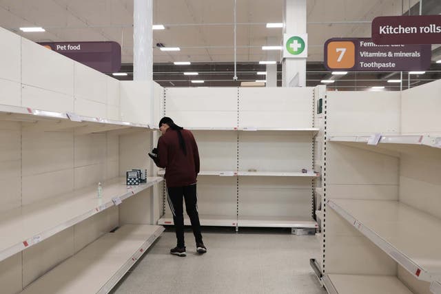 Empty shelves confront shoppers at the Nine Elms branch of Sainsbury's supermarket on 18 March 2020 in London, UK.