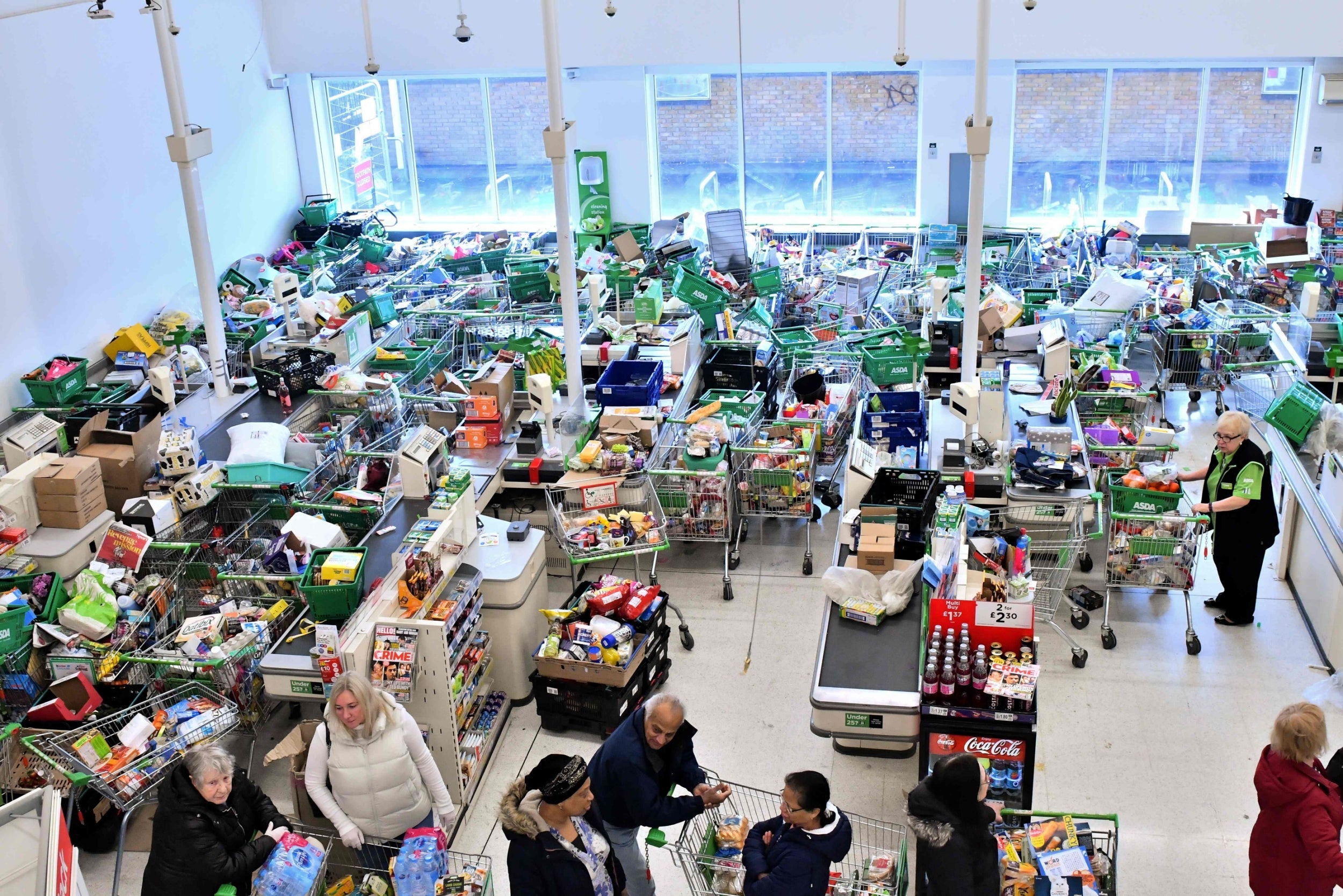 Trolleys piled high for delivery as consumers worry about shortages (AFP/Getty)