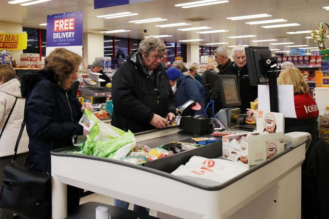 People at an Iceland store in Northwich after opening one hour early to allow elderly shoppers to buy food, 18 March 2020