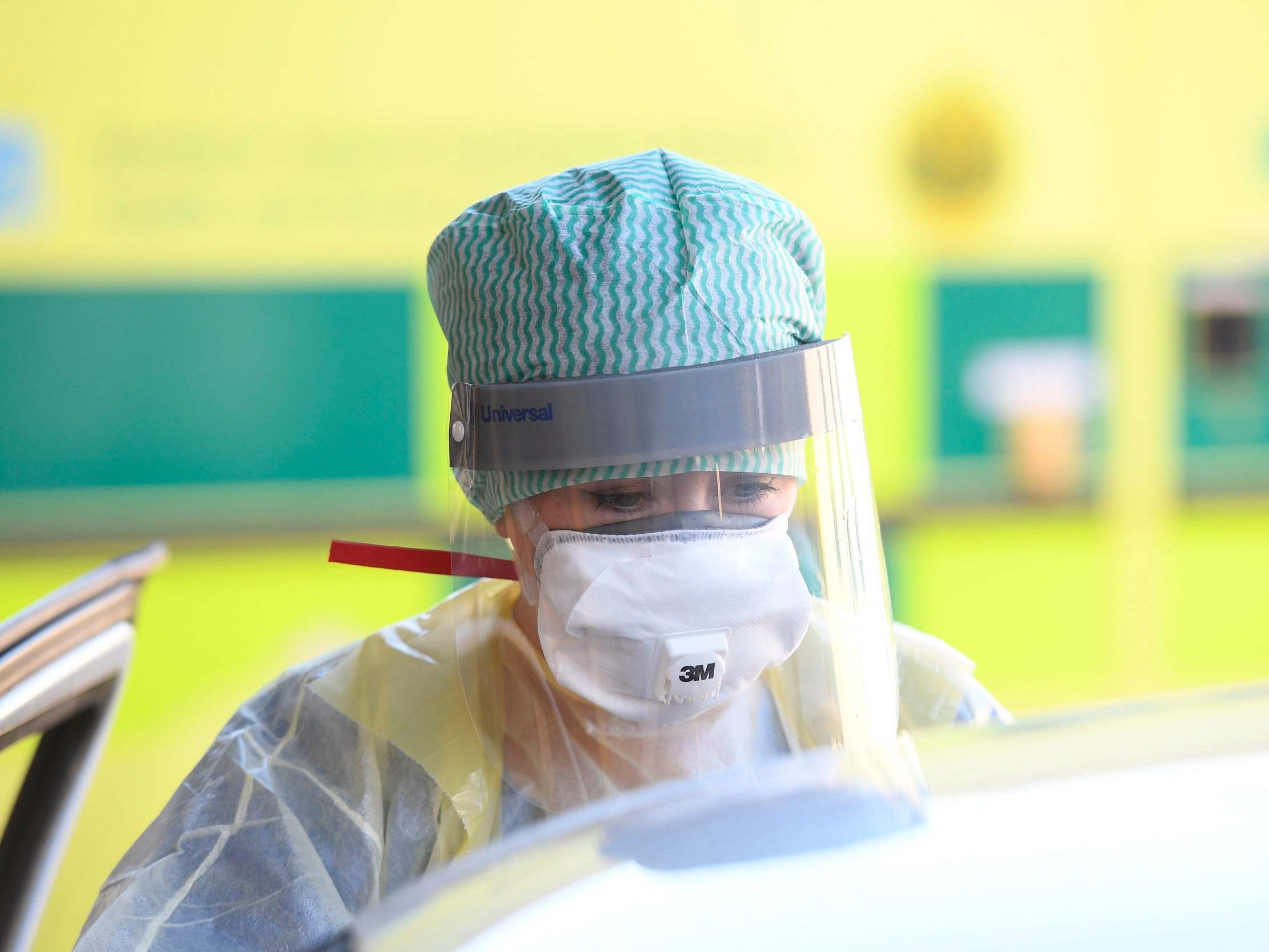 An A&E nurse wearing full protective equipment in the early months of the pandemic