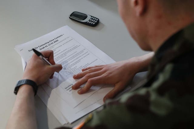 A Defence Forces cadet who is being trained to assist with the staffing of the call cente handling contract tracing for coronavirus patients at Dr Steevens' Hospital in Dublin