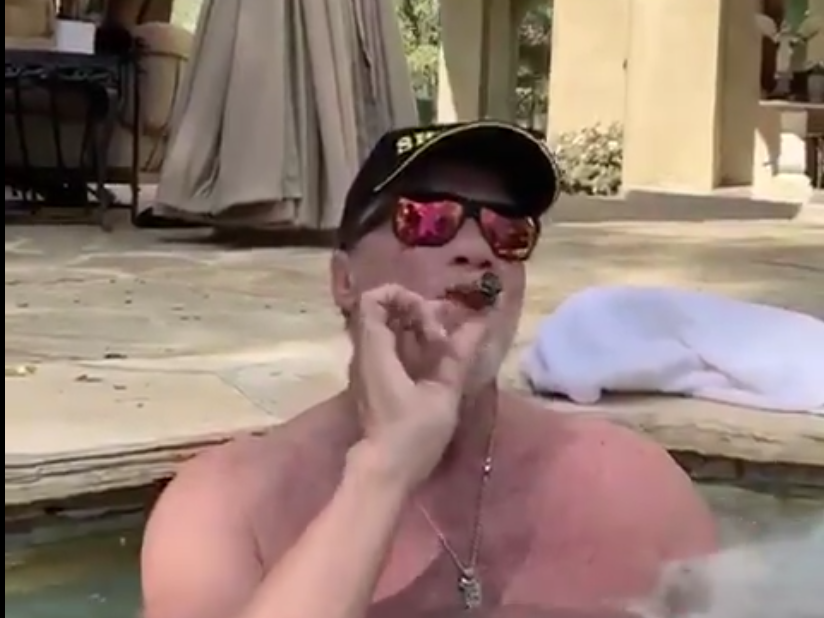 Arnold Schwarzenegger tells world to practise social distancing, while smoking cigar in hot tub The Independent The Independent photo