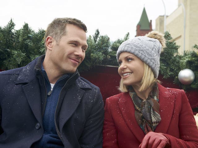 Luke Macfarlane and Candace Cameron Burre in 'A Shoe Addict's Christmas'