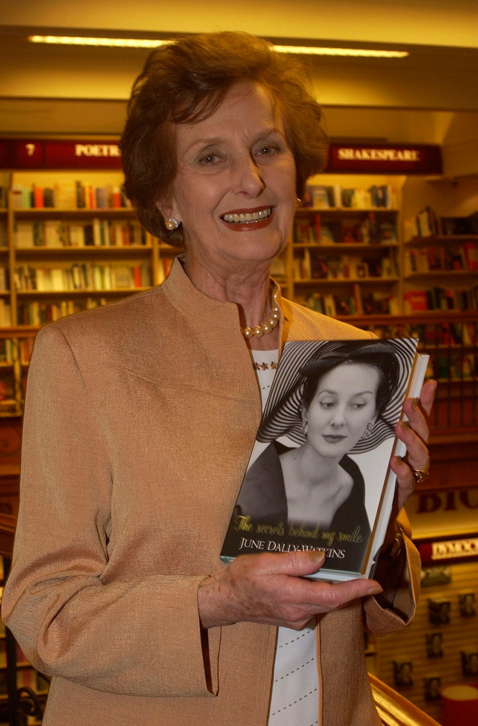 Behind the smile: at the launch of her revealing autobiography in 2002