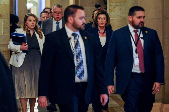 Democratic House Speaker Nancy Pelosi arrives for talks on a stimulus package with Senate Majority leader Mitch McConnell