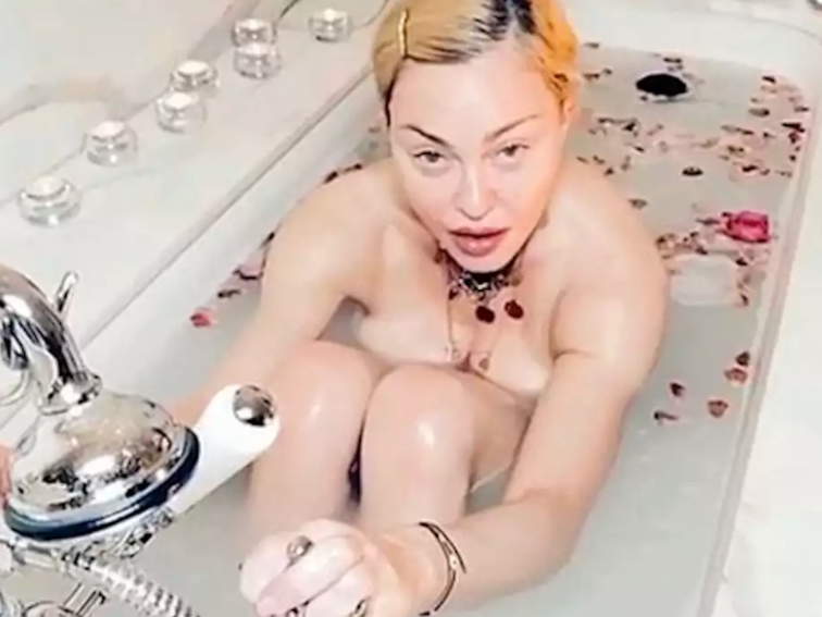 Coronavirus: Madonna calls pandemic &apos;the great equaliser&apos; in bizarre nude bathtub video