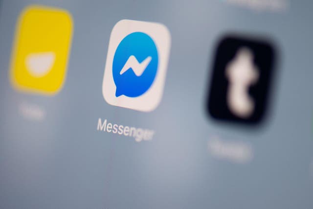 This illustration picture taken on July 24, 2019 in Paris shows the logo of the instant messaging application of Facebook called Messenger on the screen of a tablet