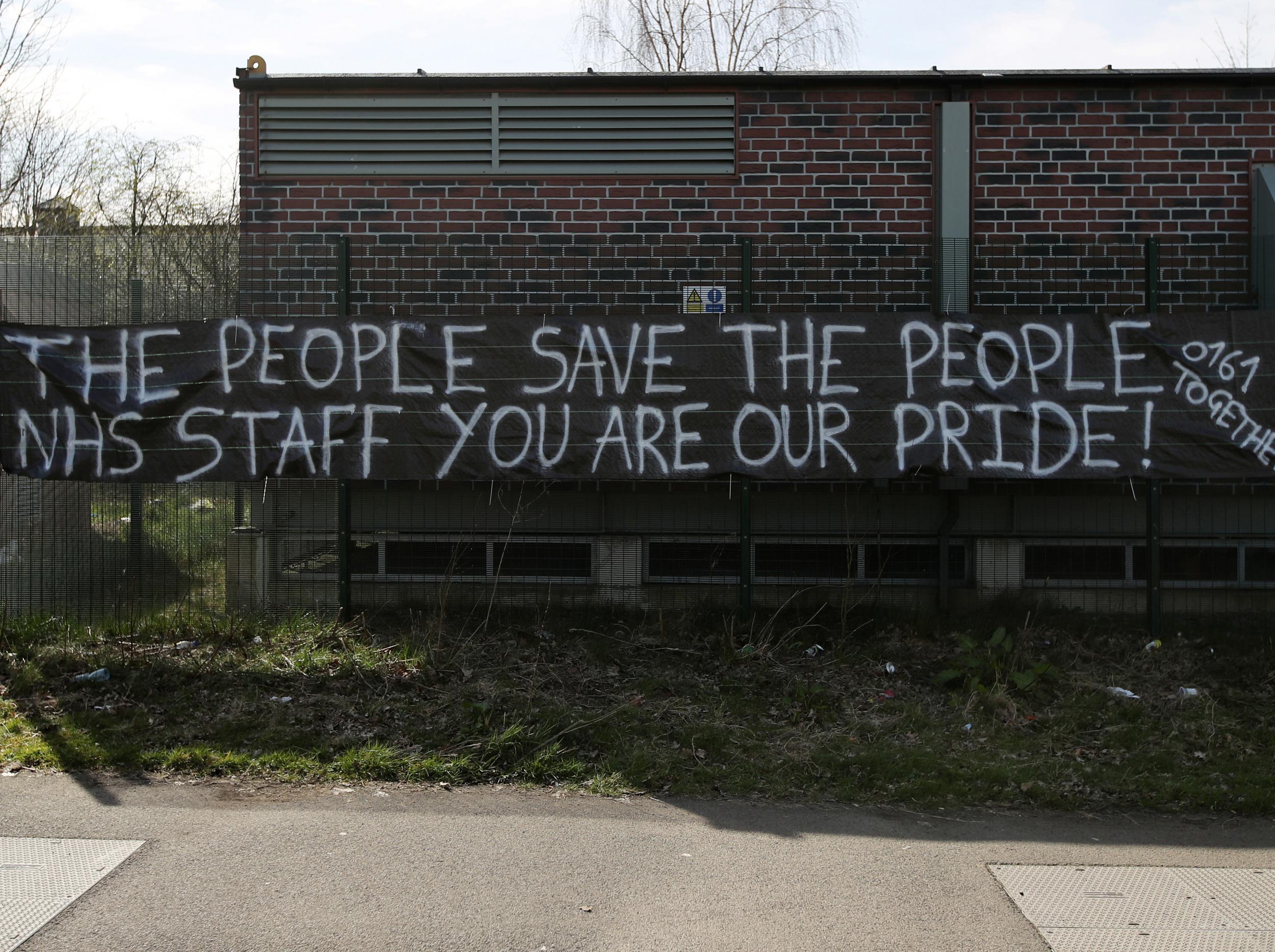 A banner supporting NHS workers seen in Manchester