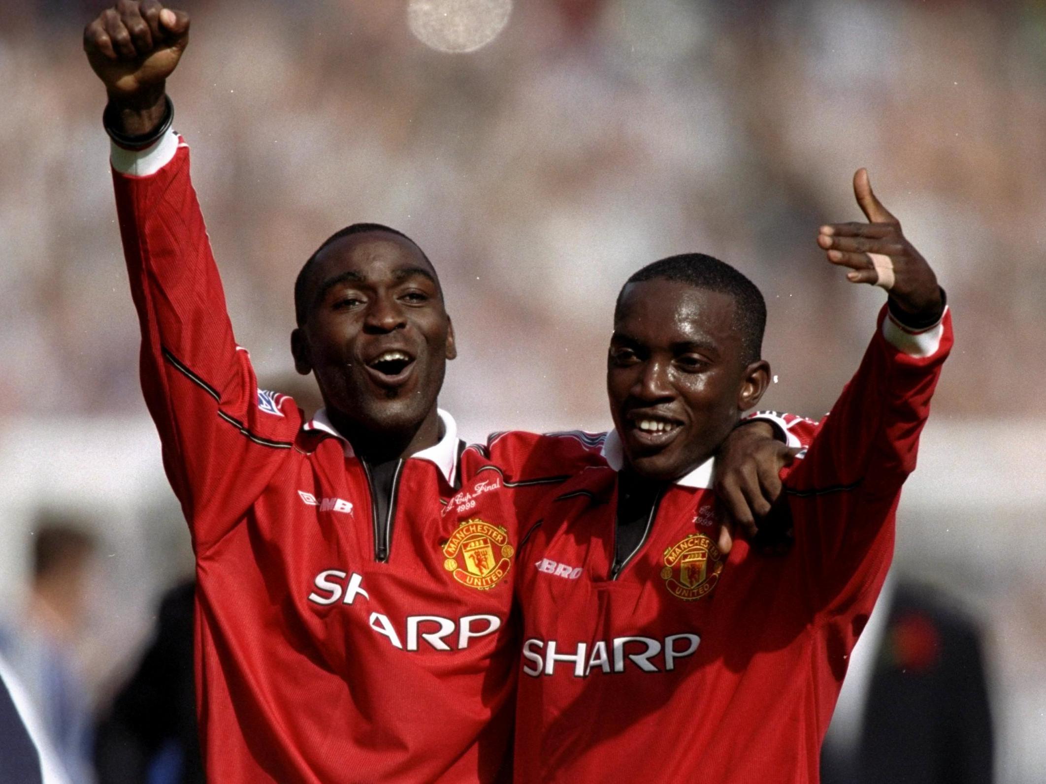  Dwight Yorke and Andy Cole celebrating a goal for Manchester United during the 1998-99 season.