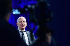 Protesters set up guillotine in front of Jeff Bezos home