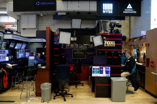 The Fox Business News set at the New York Stock Exchange stands empty after traders tested positive for coronavirus